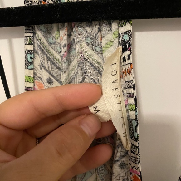 Geometric romper with pockets - Picture 2 of 2